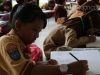 Siswa SD di Tanjungpinang saat menjadi peserta Pesta Siaga Pramuka 2018. Ia mengikuti perlombaan melukis. (f-ang) Siswa SD di Tanjungpinang saat menjadi peserta Pesta Siaga Pramuka 2018. Ia mengikuti perlombaan melukis. (f-ang)