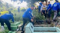 Bupati Anambas Aneng, kader dan pengurus Demokrat bersama Pemerintah Kabupaten Kepulauan Anambas turun langsung membersihkan kawasan Tempat Pemakaman Umum (TPU), Jumat (21/8/2026).